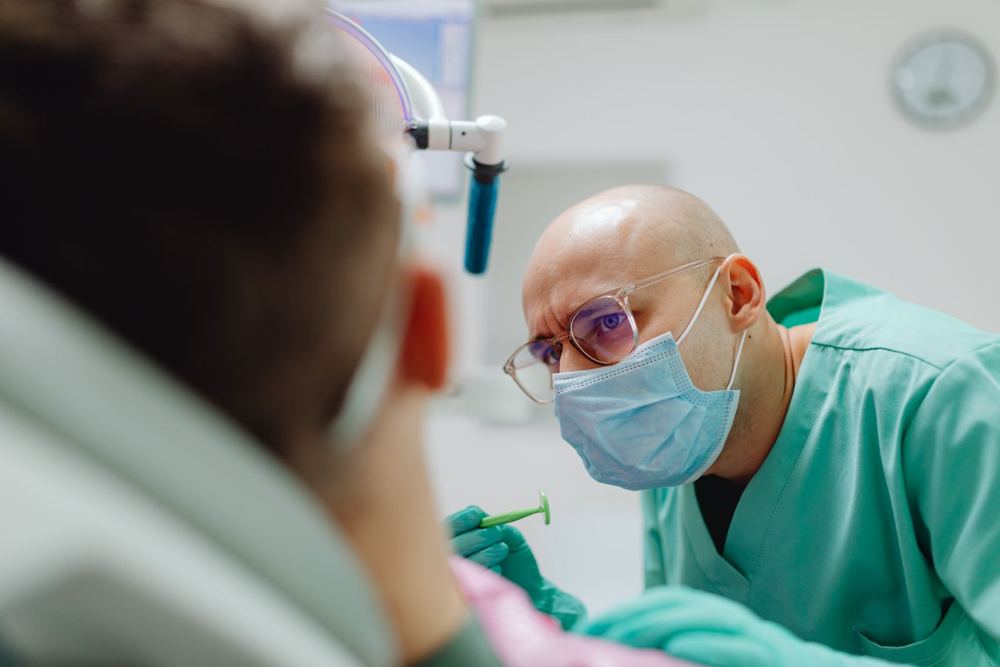 Dentist examining a patient
